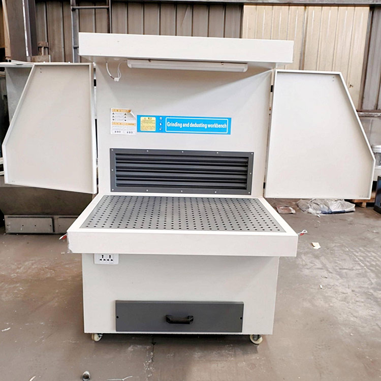 Vacuum grinding table